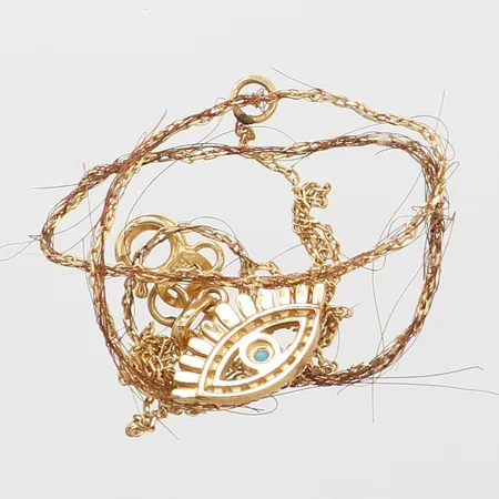 Guldskrot, hår, stenar, 14K. Vikt: 1,7 g