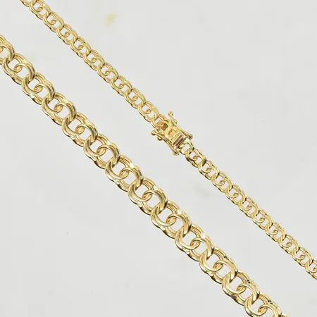 Collier Bismarck, doserad, längd 50 cm, bredd 4-7 mm, 18K. Vikt: 19,4 g