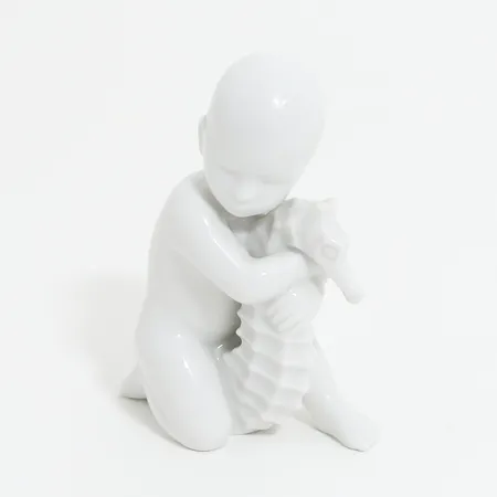 Figurin pojke med sjöhäst, Bing & Gröndahl, höjd: ca 11cm, modell 2396