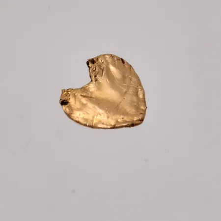 Defekt guld, 18K, vikt 0,14g.