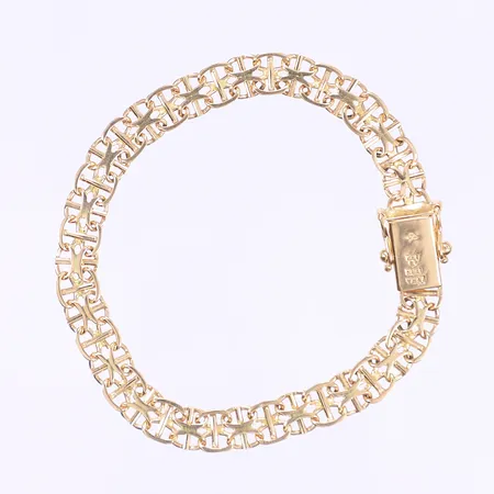 Armband, x-länk med stav, längd 19cm, bredd 7mm, svenska stämplar 1963, 18K Vikt: 11,5 g