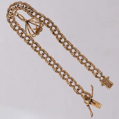 Armband Bismarck med berlock, längd 17,5cm, bredd 5,5mm, 18K Vikt: 8,6 g