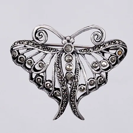 Brosch med markasiter, längd: ca 3,2cm, bredd: ca 1-4cm, ccc, en markasit saknas, silver, 925/1000 Vikt: 6,4 g