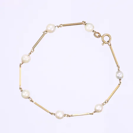 Armband med pärlor och stavar av guld, längd 18cm, bredd 1-5mm, pärlorna med ytskador, 18K Vikt: 3,7 g