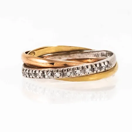 Ring i 18K trefärgat guld med 10 x 0,005ct 8/8 slipade diamanter. Den är i storlek 16¾, är 4,5 mm bred och väger 2,3g. Stämplad GFAB (Guldfynd), 750.