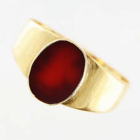 Klackring, brun sten, stl 19, bredd 2-11mm, skev skena, 18K. Bruttovikt: 3,4gram. Vikt: 3,4 g