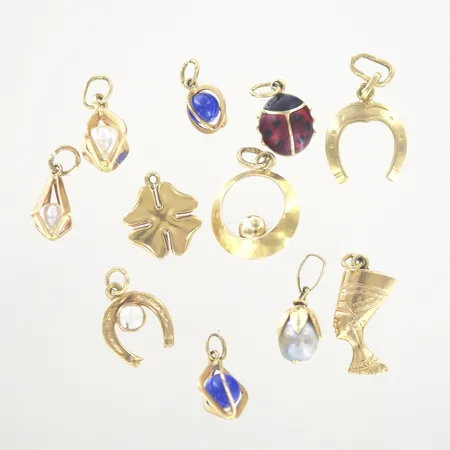 Berlocker, 1 sliten pärla, 18K Vikt: 8,8 g