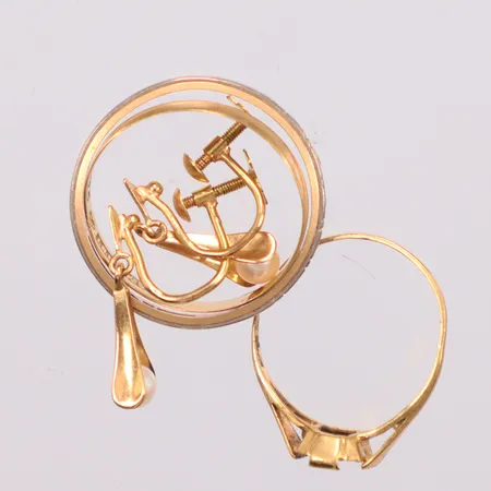 Parti guld defekt 18k Vikt: 7 g