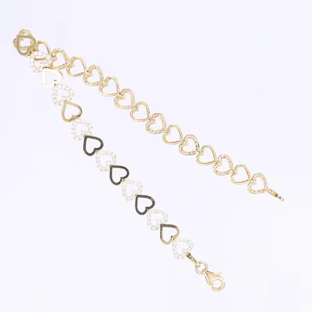 Armband med dekor av hjärtan med vita stenar, längd 18cm, bredd 6mm, 18K Vikt: 8,6 g