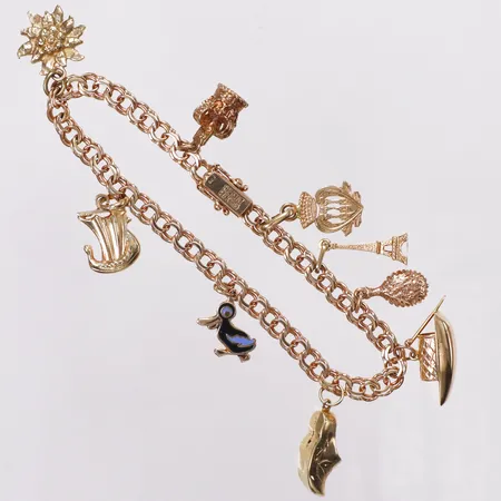 Armband, Bismarck, berlocker, 19cm, Bengt Hallberg Guldsmeds AB år 1967, några berlocker i 14K, en berlock ej i guld, en berlock bucklig, 18K Vikt: 16,7 g