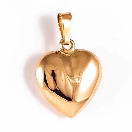 Hänge hjärta i 18K guld. Det är 14,5 mm brett, 22 mm långt inkl. ögla och väger 1,0g.