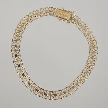 Armband X-länk med stav, längd 18 cm, bredd 6 mm, 18K Vikt: 6,9 g