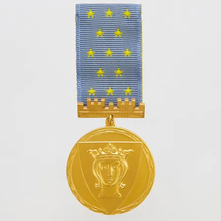 Medalj, Stockholms stad, personlig gravyr, med tygband, SPORR 14K bruttovikt 27,6g Vikt: 27,6 g
