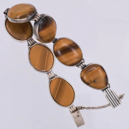 Armband med tigeröga, ca 19cm, bredd 17mm, år 1964, säkerhetskedja, 830/1000 silver Vikt: 26,4 g