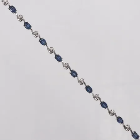 Armband, diamanter 10 x ca0,03ct, safirer, 17,5cm, bredd 4,6mm, vitguld, 18K Vikt: 10,9 g
