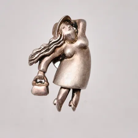 Hänge/pinn i silver, Kvinnor kan, mått 17x26,3mm, 925/1000, tillverkad av Kerstin Öhlin Lejonklou, vikt 5,54g.