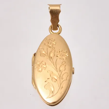 Medaljong/fotogömma i 18K guld, mått 15,3x40,5mm, sliten i spetsögla, vikt 6,05g.