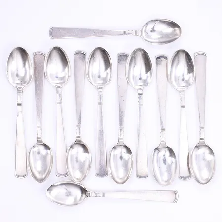 12 Mockaskedar, Rosenholm, design Jacob Ängman 1934 för GAB, dessa exemplar 1939-1967, längd 10,9cm, repor, silver 830/1000 Vikt: 149,7 g