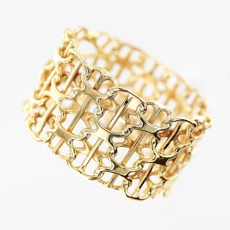 Ring, X-länk med stav, stl 17, bredd 11mm, tillverkningsdefekt vid lödning, 18K.  Vikt: 4,2 g