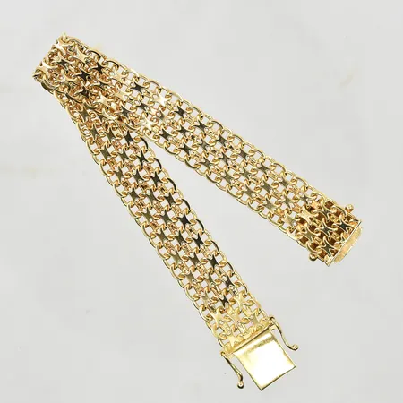 Armband X-länk, längd 17½ cm, bredd 12 mm, 18K. Vikt: 26,5 g