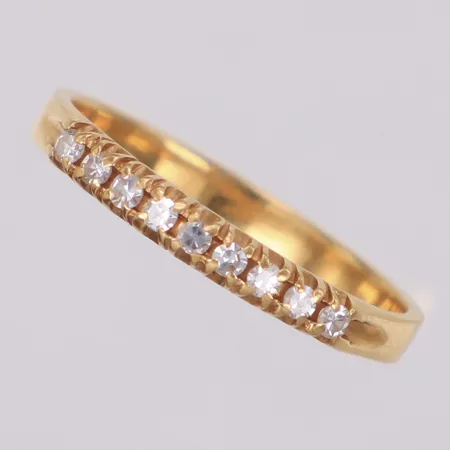 Ring med diamanter ca 0,18ctv, stl 19, bredd 3mm, 18K Vikt: 2,5 g