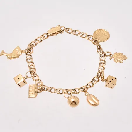 Armband i 18K guld, 17,5cm, Bismarck, bredd 4,7mm, 8st berlocker, tillverkad av BEH Bengt Hallberg Guldsmeds AB, år 1965, vikt 13,06g.