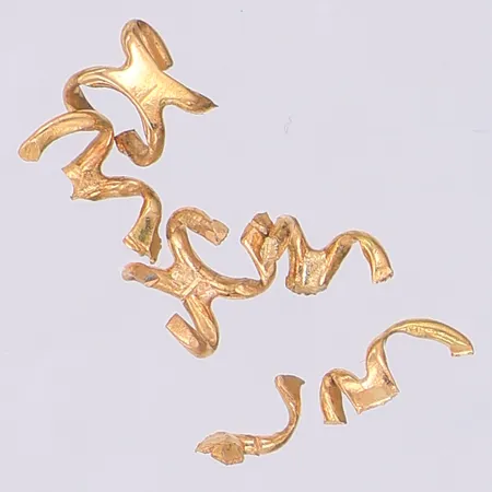 Guldbitar 18K Vikt: 0,3 g