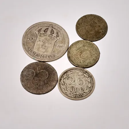 5st olika öres mynt i silver, vikt 12,32g.