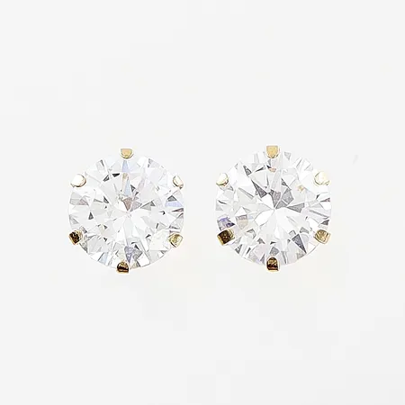 Ett par örhängen, vita stenar, Ø6mm, 18K.  Vikt: 1,2 g