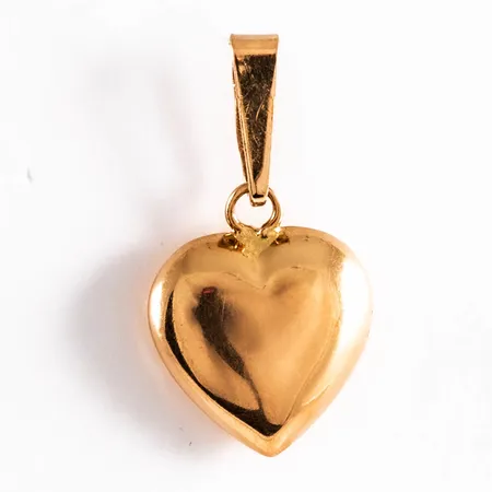 Hänge Hjärta i 18K guld. Det är 9,5 mm brett, 17,5 mm långt inkl. ögla och väger 0,4g. GFAB (Guldfynd), 750.