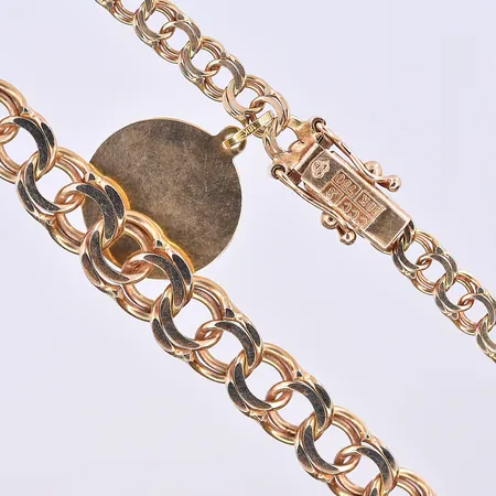 Collier Bismarck med berlock, doserad, bredd 4-8 mm, längd 45 cm, 18K. Vikt: 21 g