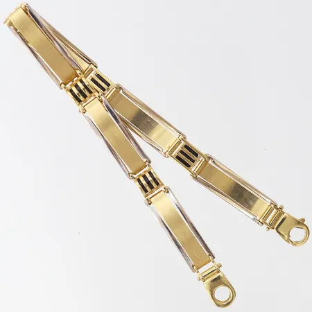 Armband, halvstelt, längd 21,5cm, bredd 8mm, gravyr på insidan, tvåfärgat 14K. Vikt: 15,5 g