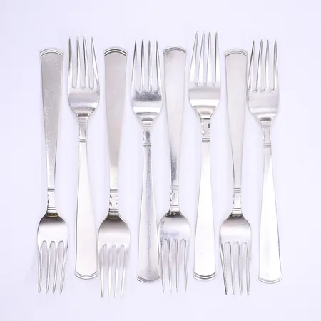 8 Bordsgafflar, Rosenholm, design Jacob Ängman för GAB 1934, dessa exemplar 1956-1999, längd 17,5cm, repor, silver 830/1000 Vikt: 308,2 g