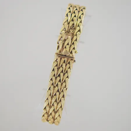 Armband, längd 19 cm, bredd 1,3 cm, liten länk defekt/lås8 saknas,18K Vikt: 27,2 g