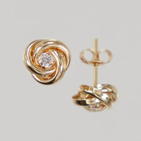 Ett par örhängen kringlor med vita stenar, Ø8,3mm, stift, GHA, 18K,  Vikt: 1,1 g