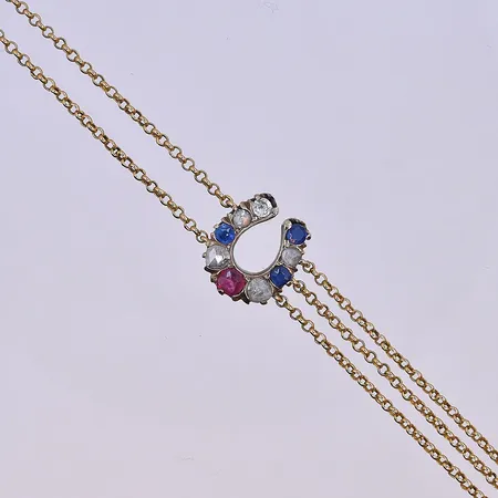 Armband med hästsko, längd 17 cm, bredd 2-15 mm, 18K. Vikt: 7,4 g