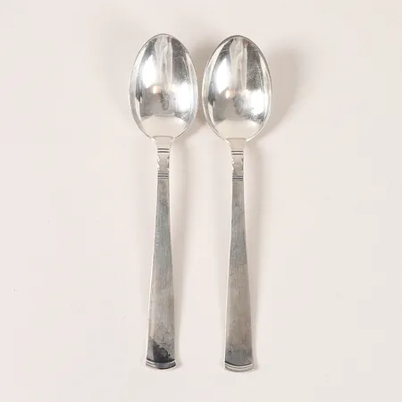 Ett par dessertskedar, modell Rosenholm, GAB, längd 15cm, slitage.  Vikt: 55,9 g