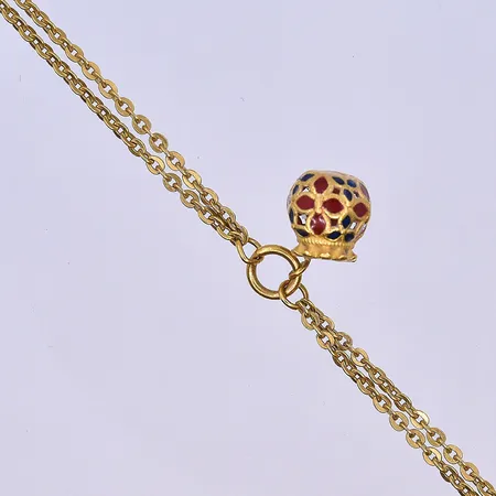 Armband med en berlock, längd 16 cm, bredd länk 2-3 mm, 23K. Vikt: 7,4 g