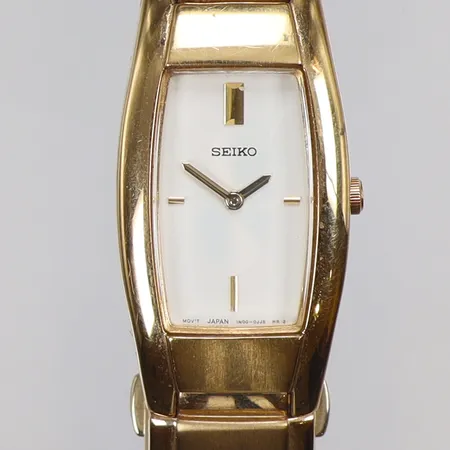 Damur Seiko 18x34mm ref nr. 1N00-0FS0 snr. 383085, quartz (går ej, troligen batteribyte), guldfärgat stål, smärre slitage 