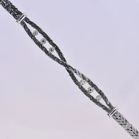Armband med diamant 0,17ct, längd 19 cm, bredd 5-8 mm, vitguld, 18K. Vikt: 18,2 g