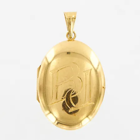 Medaljong 40mm bredd:23mm, monogramgravyr, 18K Vikt: 6,8 g