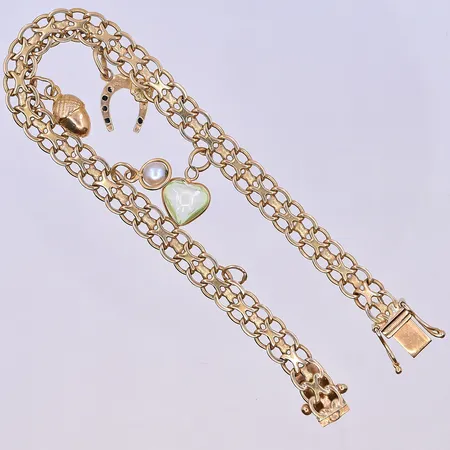 Armband X-länk med berlocker, längd 20 cm, bredd länk 7 mm, 18K. Vikt: 15,1 g