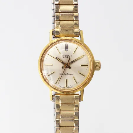 Damur Tissot Seastar seven, manuell, 18K, tvåfärgat flexband, gravyr, går ej.