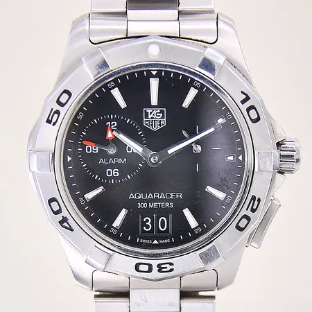 Herrur Tag Heuer Aquaracer, stål, quartz, ref-nr: WAP111Z, serie-nr: RMU8633, Ø39mm, safirglas, alarmfunktion, certifikat från 2015, batteribyte krävs, boett samt länk med mindre repor, box med slitage, manualer, ytterkartong Vikt: 0 g