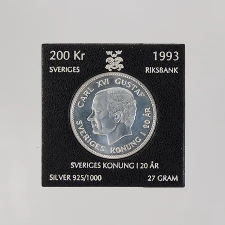 Mynt Sveriges Konung i 20år, 1993, nominellt värde: 200kr, 925/1000 silver Vikt: 27 g