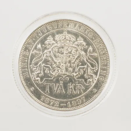 Minnesmynt, Minne af tjugufemårig regering, 1872-1897, Oscar II Sveriges Norges G O V Konung, nominellt värde 2 kr, Ø31mm, plastetui, 800/1000 silver Vikt: 15 g