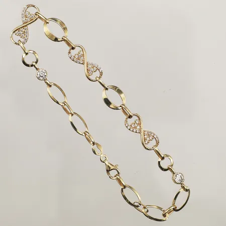 Armband med vita stenar, längd 20cm, bredd 4-8mm, 14K Vikt: 4,5 g