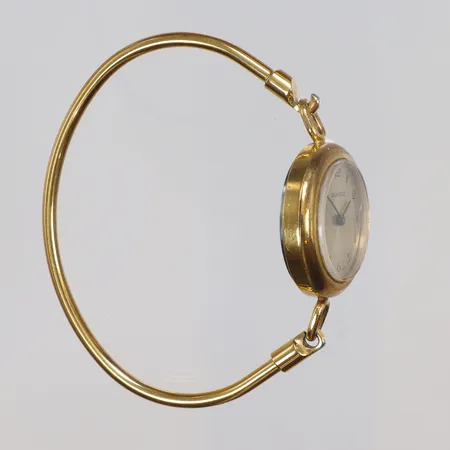 Damur Sandoz Ø24mm ref nr. 0074-0020 manuell uppdragning, gulmetall, med slitage, repor, ca 1970-tal 