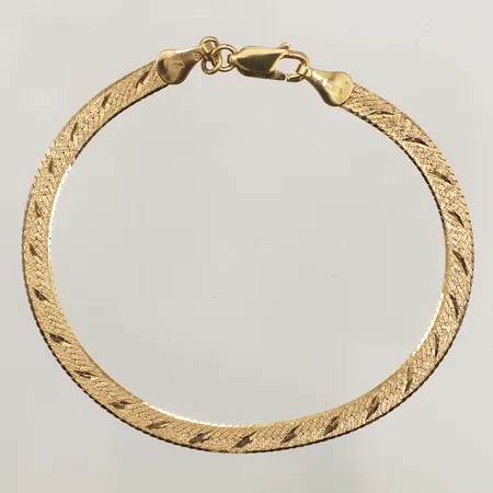 Armband, längd 18,5cm, bredd 4,1mm, 18K  Vikt: 5,3 g