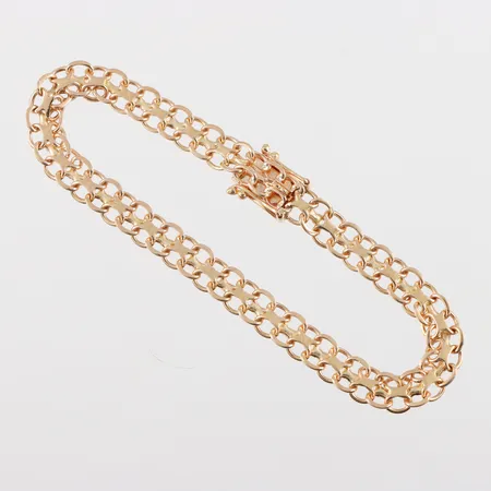 Armband X-länk 18k, längd ca 18 cm, bredd 6.2 mm, Ub:S Guld Ulf Blomqvist Stockholm 1970 Vikt: 10,7 g